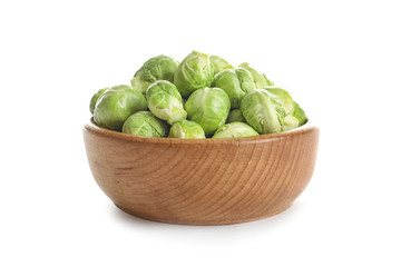 Bowl of fresh Brussels sprouts isolated on white