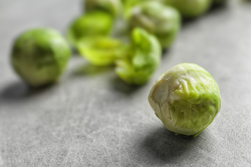 Fresh Brussels sprout on table. Space for text