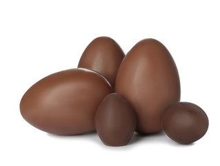 Tasty chocolate Easter eggs on white background