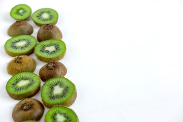 Background for the profile, design, printing with fruit. Fresh kiwi sliced. The basis for the...