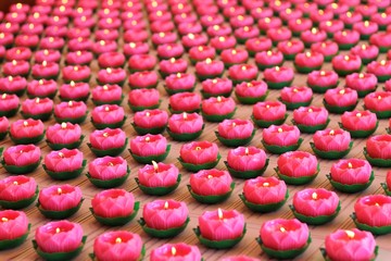 Selective focus, Many pink lotus of candle on the table.