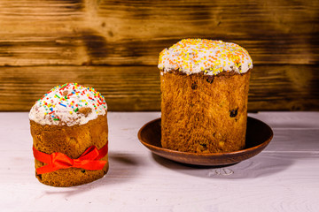 Ukrainian easter bread kulich on a white wooden table