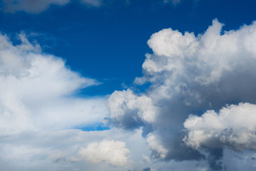 Naklejka na ściany i meble Heavenly blue sky with clouds as background