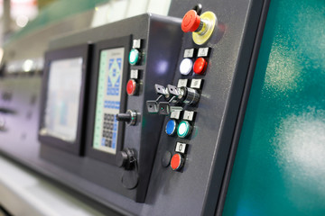 control panel of a modern manufacturing machine