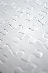 Close-up of white puzzle completed