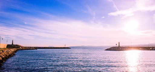 Naklejka premium Port. The port of the city of Estepona, the Mediterranean Sea, boats, lighthouse.