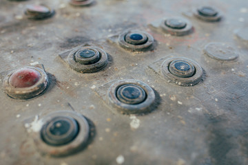 Old broken dirty control panel, switchboard or control desk. Old grungy rustic control panel buttons of an old machine. Industrial vintage background. 