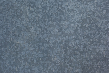 khaki speckled dark background,texture of the metal table a few years later in the open air