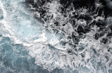 Fototapeta na wymiar Malta seawave. Mixing of water flows from the ship. Rough sea waves. 