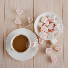 Hot  coffee with hearts pink marshmallow for valentine's day