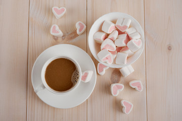 Hot  coffee with hearts pink marshmallow for valentine's day