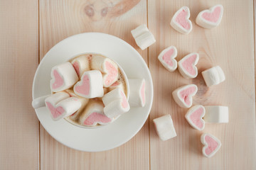 Hot  coffee with hearts pink marshmallow for valentine's day