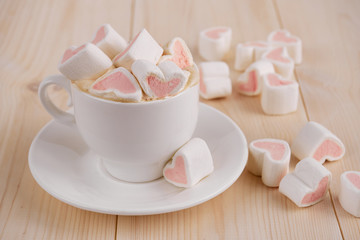 Hot  coffee with hearts pink marshmallow for valentine's day