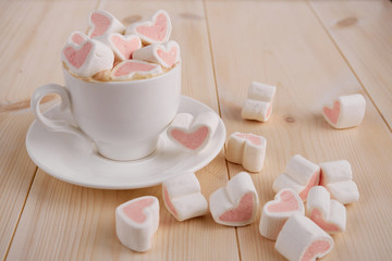Hot  coffee with hearts pink marshmallow for valentine's day