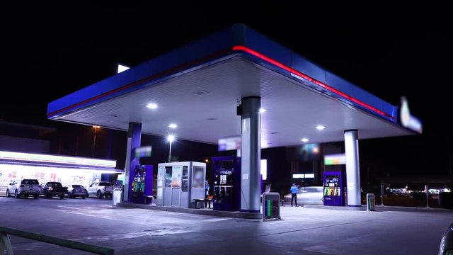 Time lapse of gas station, car refuel the energy