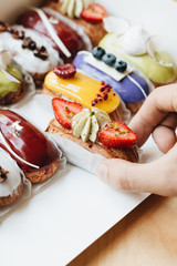 Set of delicious sweets with glaze, colorful dessert