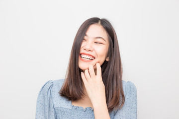 Laughing of beautiful asian women on white background