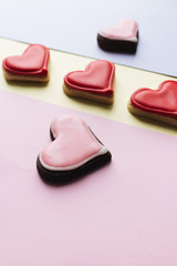 Cookies in heart shape with red glaze , valentines day celebration 