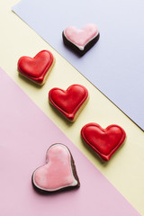 Cookies in heart shape with red glaze , valentines day celebration 