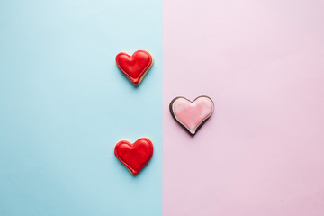 Obraz na płótnie Canvas Cookies in heart shape with red glaze