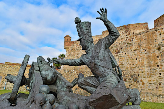 Bronze statue of a soldier and a cannon at Ceuta Castle, Ceuta, Spain