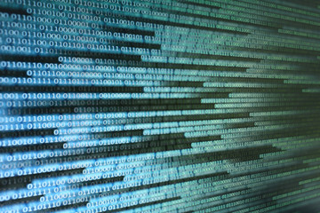 binary data on computer monitor. multiple layers of codes streaming signifying transferring information over internet medium.