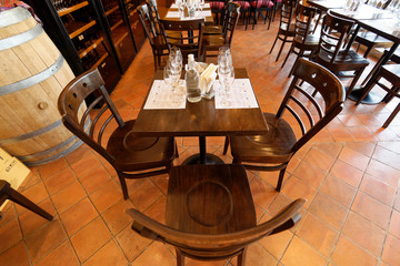 Tables and chairs in restaurant