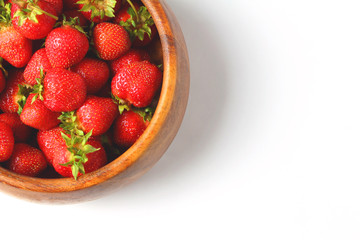 wooden dish with strawberries. white background, flat lay, copy space