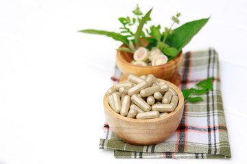 Alternative herbal medicine on wooden table for healthy eating 