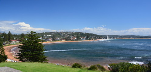 Panoramic view of Collaroy beach on a sunny day. A great place to relax as the beach is mainly frequented by locals.