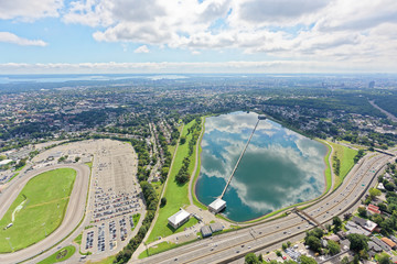 Aerial view of clouds reflected in Hillview Reservoir, looking south