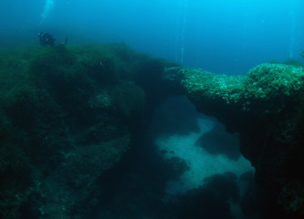Fototapeta na wymiar Scuba Diving Malta - Green Arch Cirkewwa