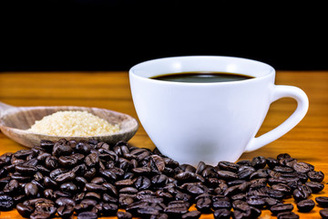The Coffee Cup With Wooden Background