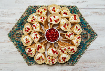 Arabic sweet pancakes with filling. Top view.