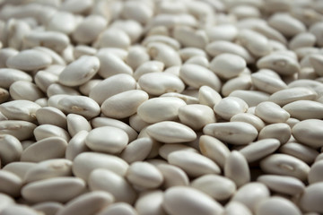 Lots of white large beans, background. Useful legumes