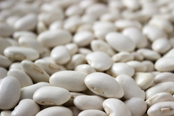 Fototapeta na wymiar Lots of white large beans, background. Useful legumes