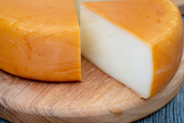 Fresh, round cheese.