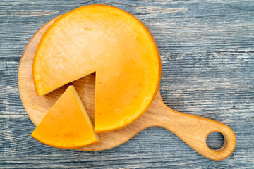 Fresh, round cheese.