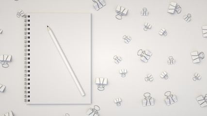 Notebook with pencil and binder clips