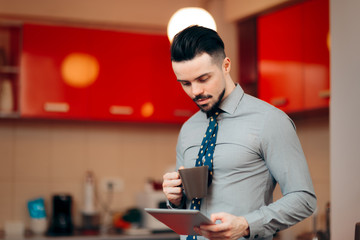 Businessman Drinking Coffee and Reading News on PC Tablet