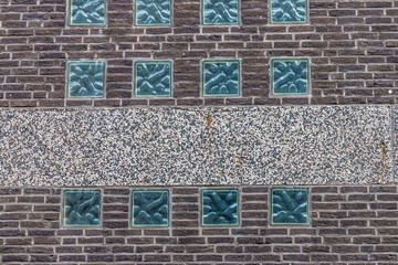 Windows on brick wall