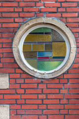 Windows on brick wall