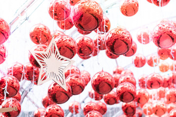 Christmas decoration : Gold star among the red balls