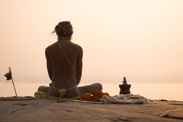 yogi on the banks of the Ganges india varanasi