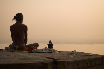 yogi on the banks of the Ganges india varanasi