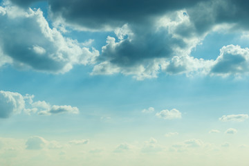 sunlight through cloud on blue sky