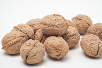 Walnut on a white scene