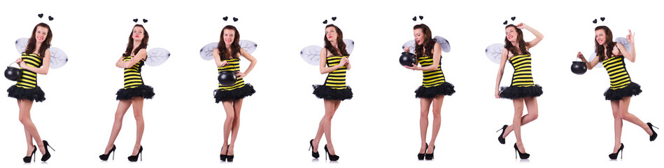 Young woman in bee costume isolated on white