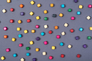 Wooden color beads composition. Needlework concept background. Flat lay