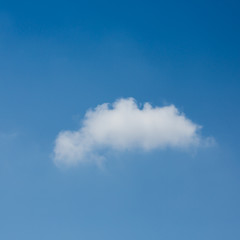 single cloud on clear blue sky